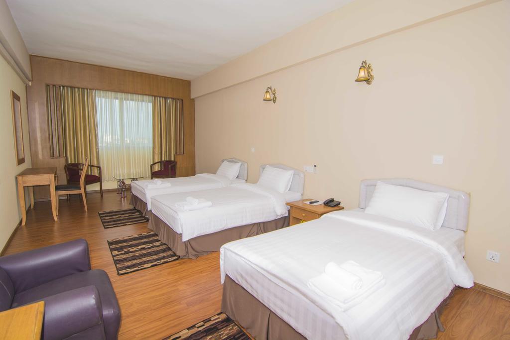 Asia Plaza Hotel Yangon Chambre photo
